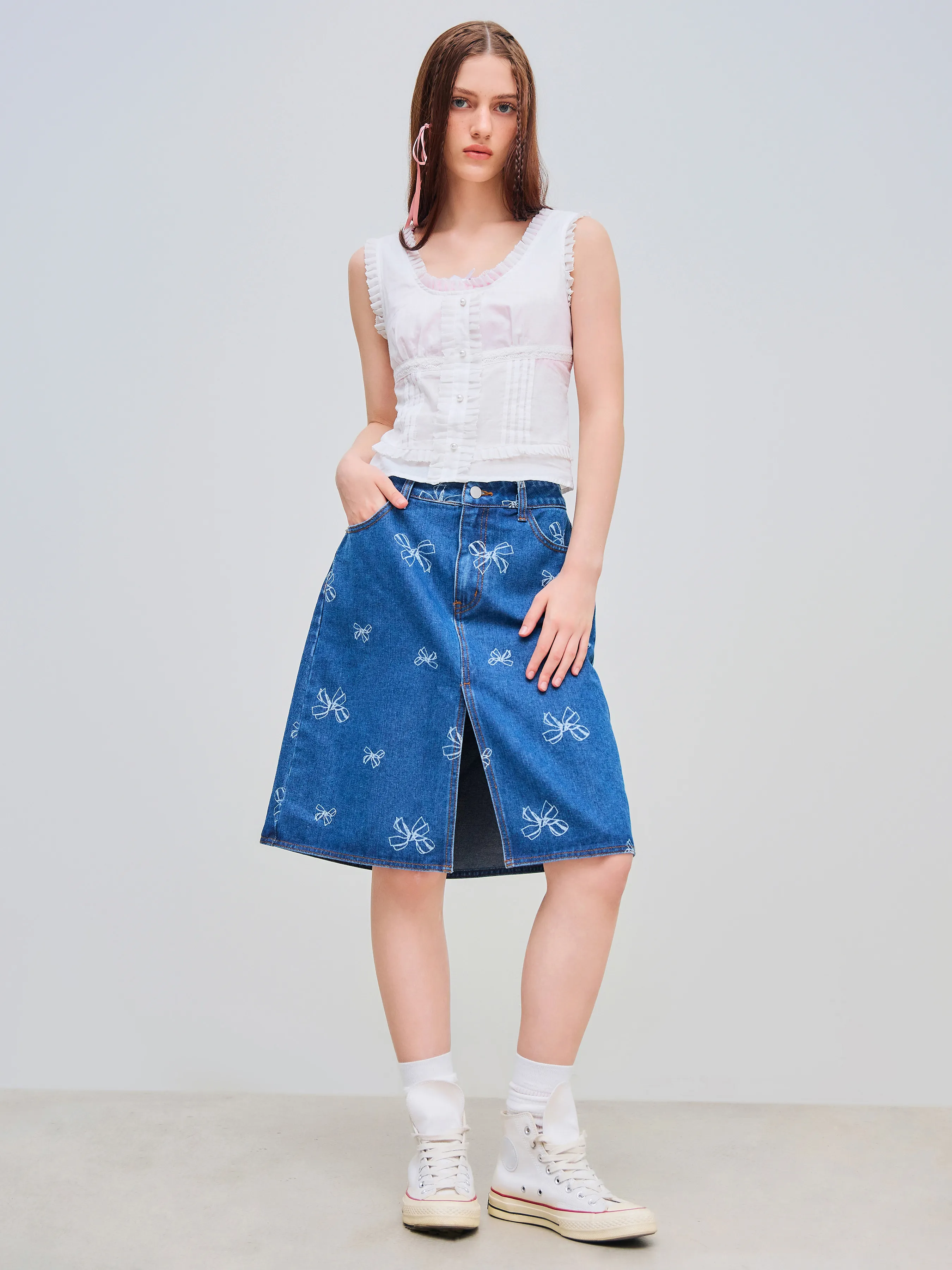 Jupe mi-longue en denim à taille mi-haute avec nœud imprimé